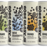 Four cans of Sparklebuck sparkling buckwheat tea with different flavors on a white background.